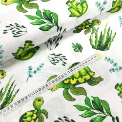 Cotton fabric printed with green seam turtles and plants
Nikita Loup
