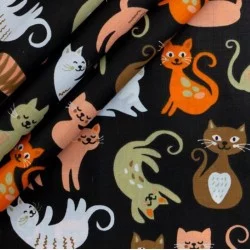 Fabric adorable cats black cotton background
Nikita Loup