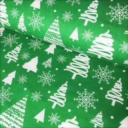 Tessuto di albero di Natale e fiocco di neve su sfondo verde